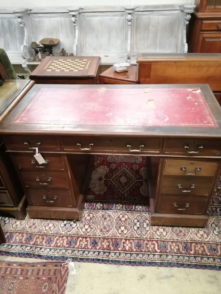 An early 20th century mahogany pedestal desk, length 120cm, depth 61cm, height 75cm